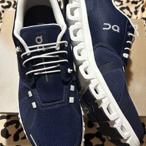 On Running Blue and White Sneakers with Sleek Design